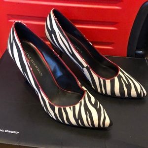 Zebra printed pointed toe red heel